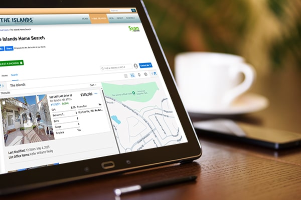 Tablet with The Islands home search on screen